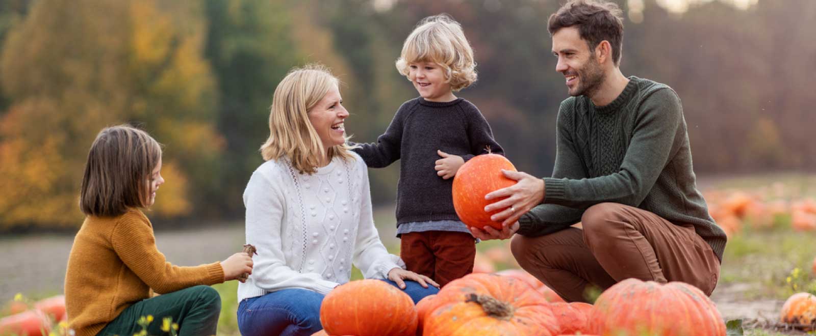 Happy family celebrates successful investments.